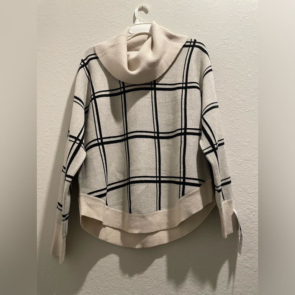 Loose turtle neck fall sweater. Cream with black stripes. New with tag
